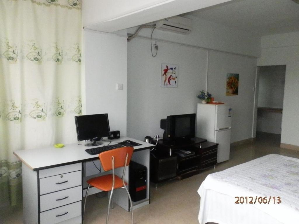 Xingfu Hotel Nanning Szoba fotó