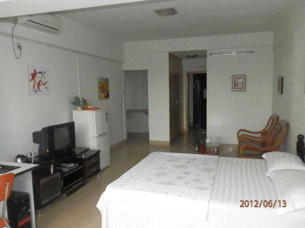 Xingfu Hotel Nanning Szoba fotó