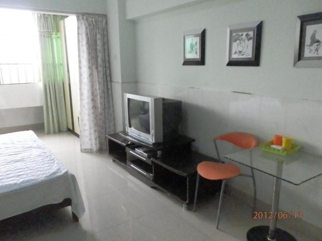 Xingfu Hotel Nanning Szoba fotó