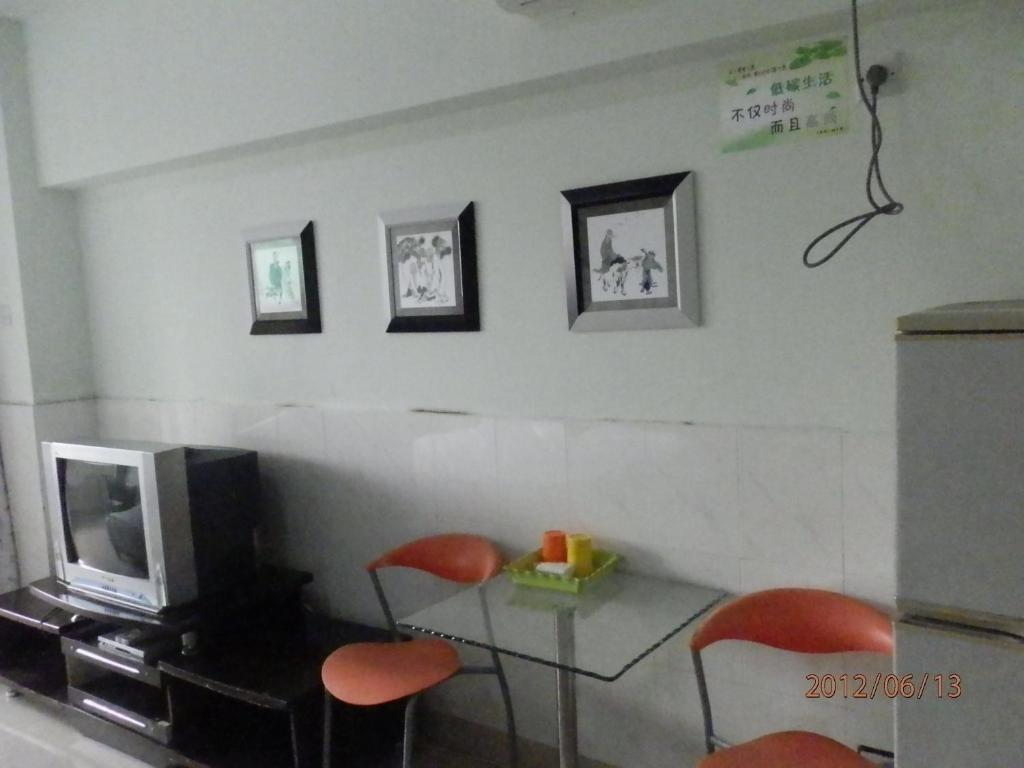 Xingfu Hotel Nanning Szoba fotó