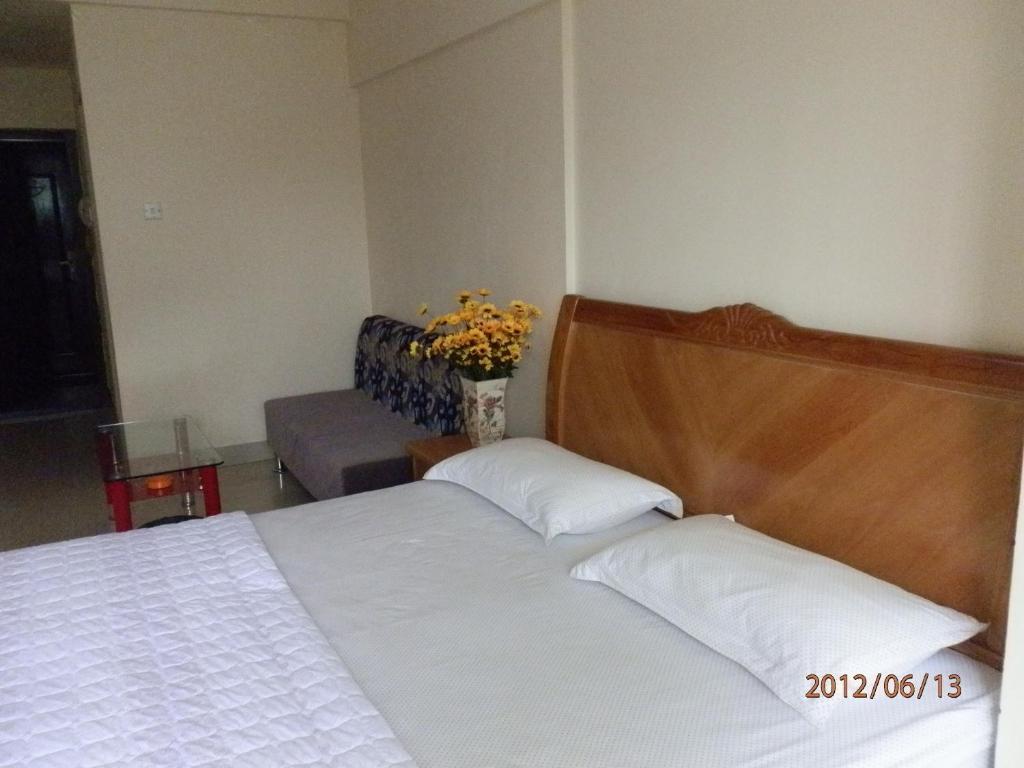 Xingfu Hotel Nanning Szoba fotó