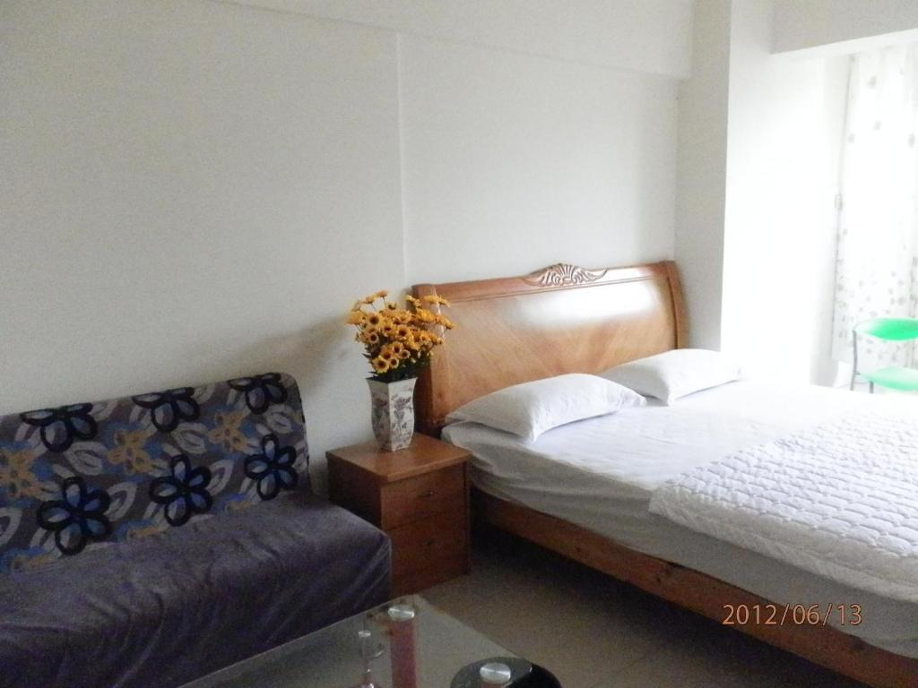 Xingfu Hotel Nanning Szoba fotó